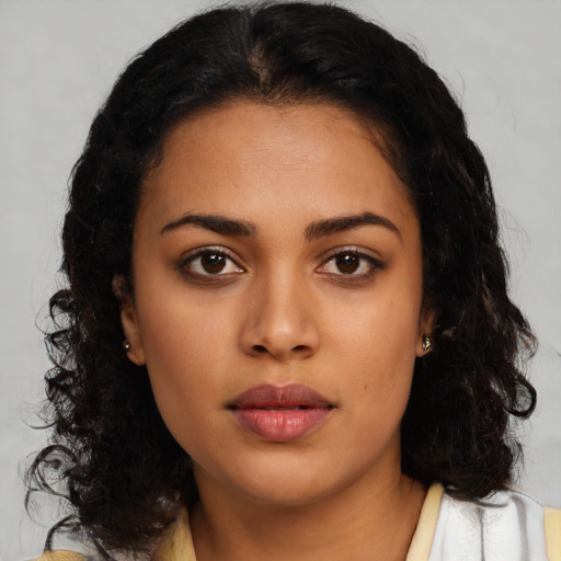 Neutral latino young-adult female with long  black hair and brown eyes