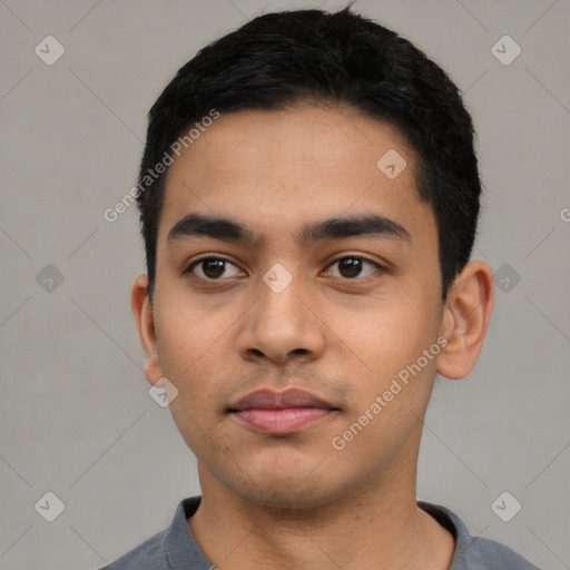 Neutral latino young-adult male with short  black hair and brown eyes