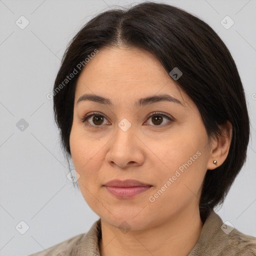 Joyful white adult female with medium  brown hair and brown eyes