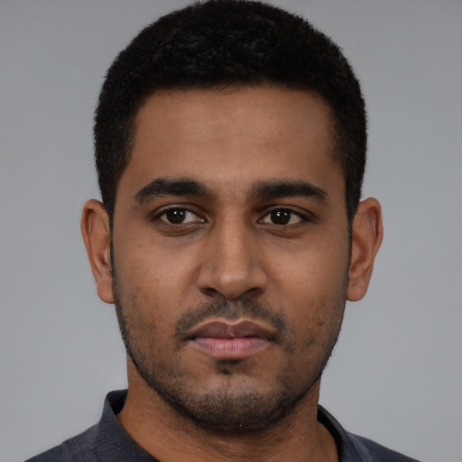 Neutral black young-adult male with short  black hair and brown eyes