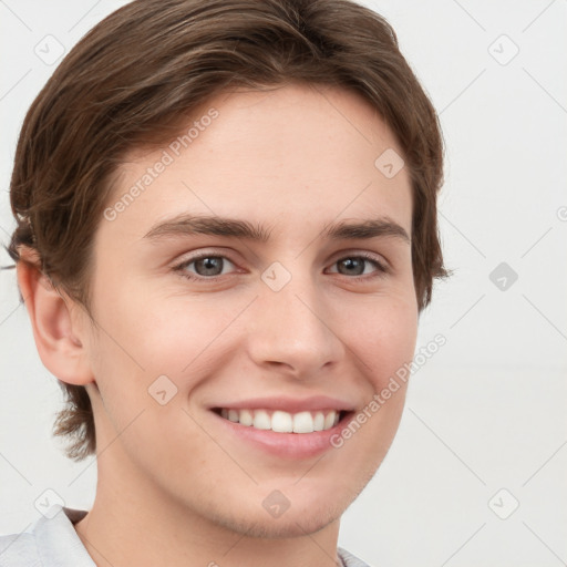 Joyful white young-adult female with short  brown hair and grey eyes