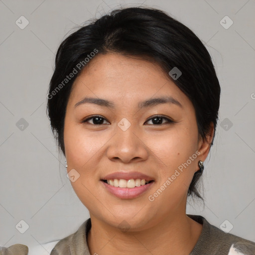 Joyful asian young-adult female with medium  black hair and brown eyes