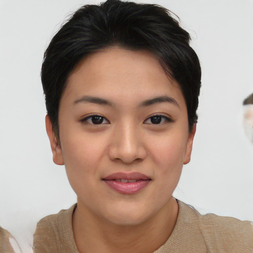 Joyful asian young-adult female with short  brown hair and brown eyes