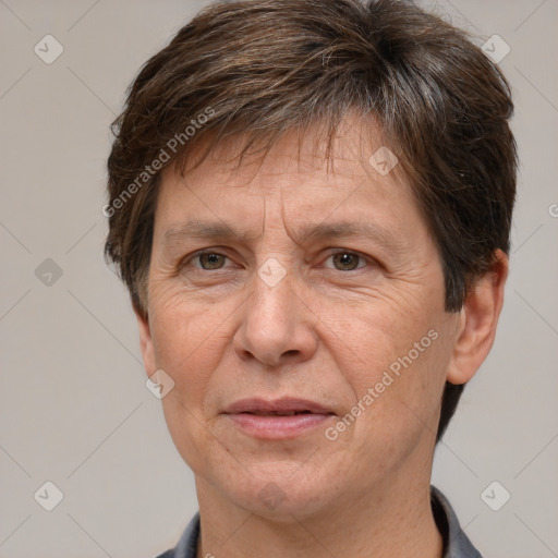 Joyful white middle-aged male with short  brown hair and brown eyes