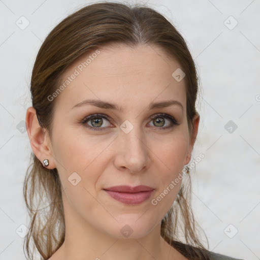 Joyful white young-adult female with long  brown hair and grey eyes