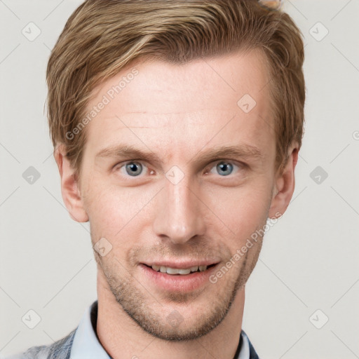 Joyful white young-adult male with short  brown hair and grey eyes