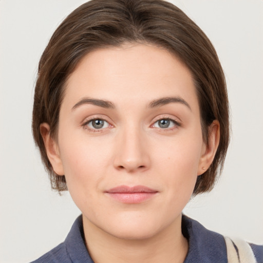 Neutral white young-adult female with medium  brown hair and grey eyes