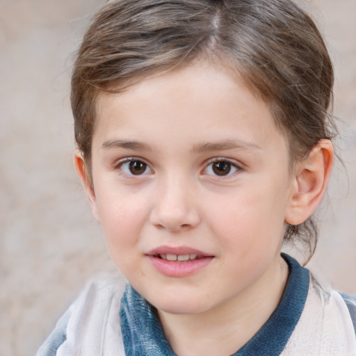 Joyful white child female with short  brown hair and brown eyes