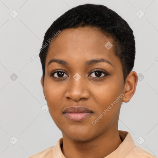 Joyful black young-adult female with short  black hair and brown eyes