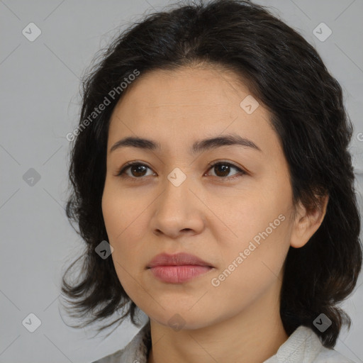 Joyful asian young-adult female with medium  brown hair and brown eyes