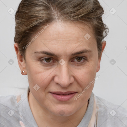 Joyful white adult female with short  brown hair and grey eyes