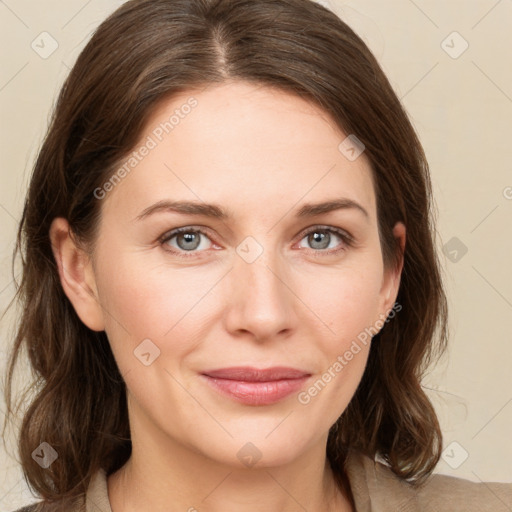 Joyful white young-adult female with medium  brown hair and green eyes