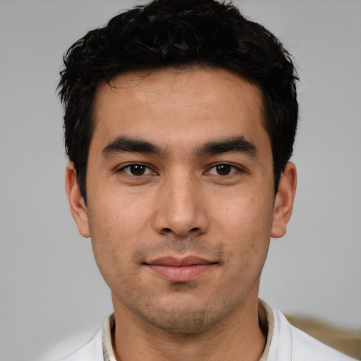 Neutral white young-adult male with short  black hair and brown eyes