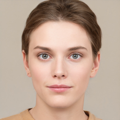 Neutral white young-adult female with short  brown hair and grey eyes