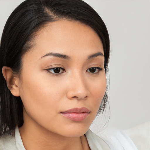 Neutral asian young-adult female with long  brown hair and brown eyes