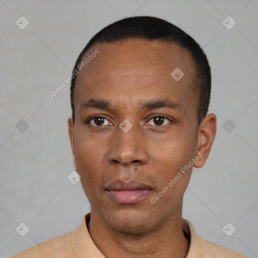 Neutral latino young-adult male with short  black hair and brown eyes