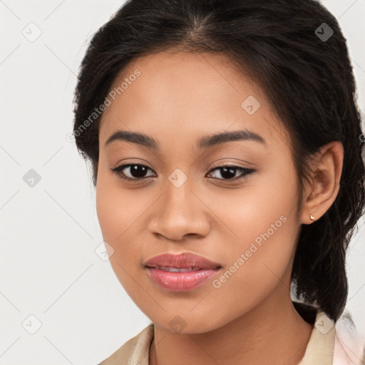 Joyful latino young-adult female with long  brown hair and brown eyes