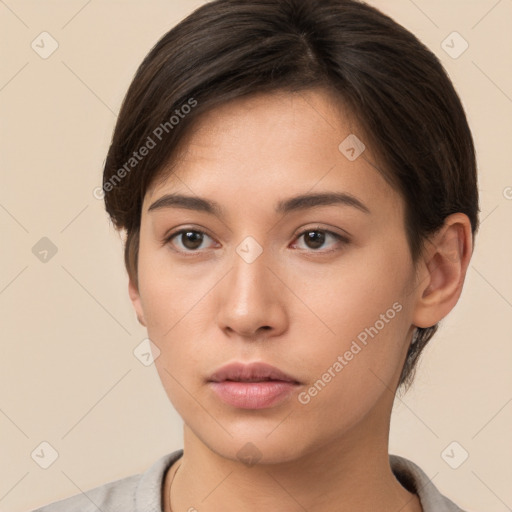 Neutral white young-adult female with short  brown hair and brown eyes