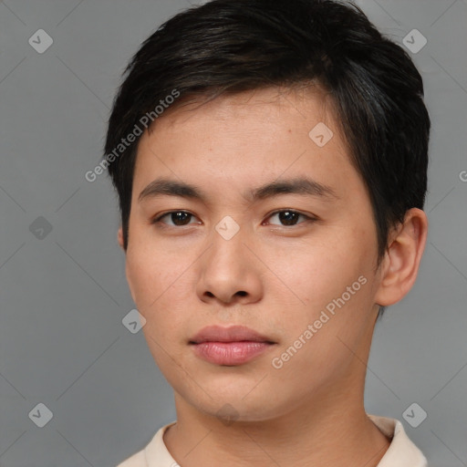 Neutral asian young-adult male with short  brown hair and brown eyes