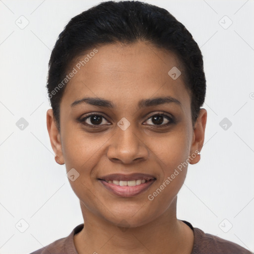 Joyful latino young-adult female with short  black hair and brown eyes