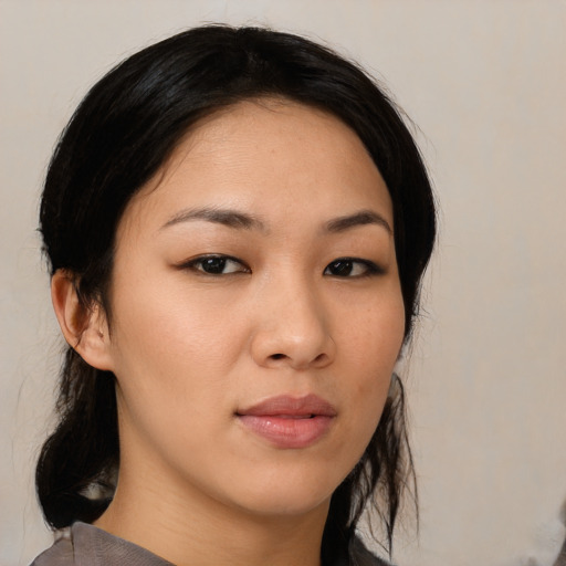 Neutral asian young-adult female with medium  brown hair and brown eyes