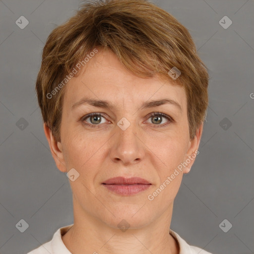 Joyful white adult female with short  brown hair and grey eyes