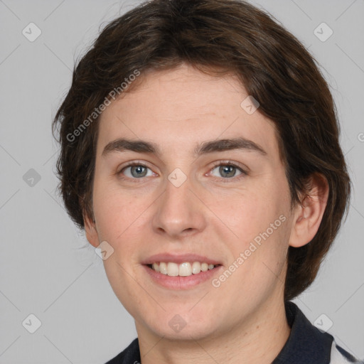 Joyful white young-adult male with medium  brown hair and brown eyes