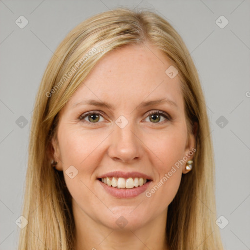 Joyful white young-adult female with long  brown hair and brown eyes