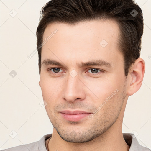 Neutral white young-adult male with short  brown hair and brown eyes