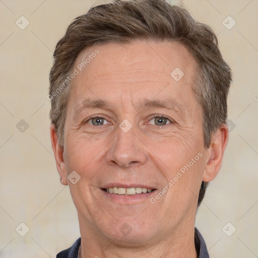 Joyful white middle-aged male with short  brown hair and brown eyes