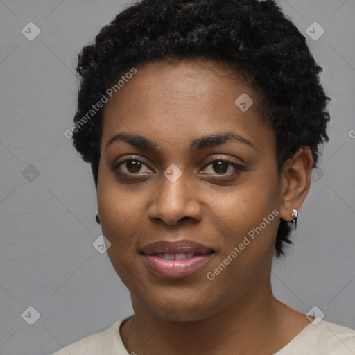 Joyful black young-adult female with short  black hair and brown eyes