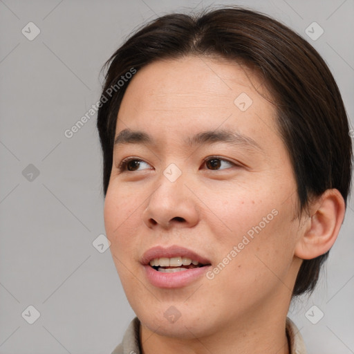 Joyful asian young-adult female with medium  brown hair and brown eyes