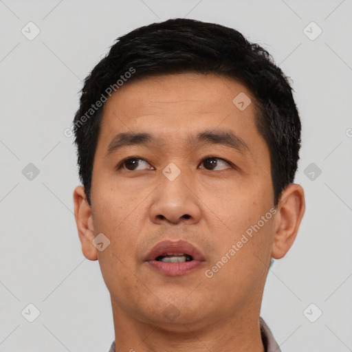 Neutral asian young-adult male with short  black hair and brown eyes