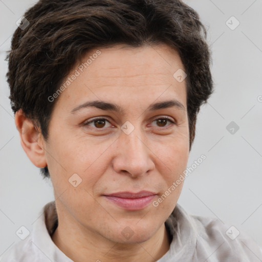 Joyful white adult female with short  brown hair and brown eyes