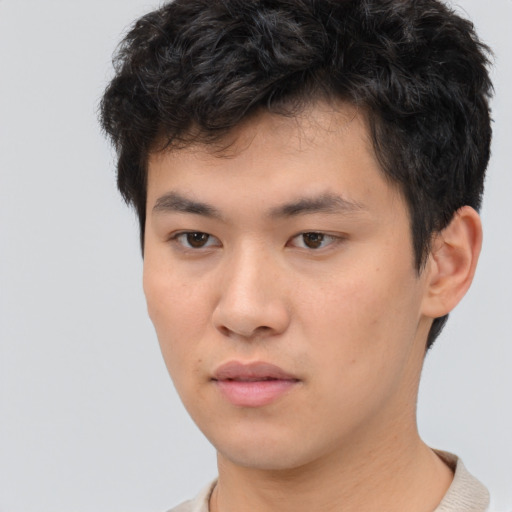 Neutral asian young-adult male with short  brown hair and brown eyes