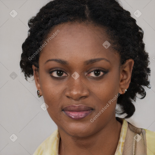 Joyful black young-adult female with long  brown hair and brown eyes