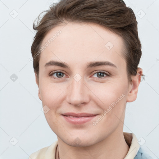 Joyful white young-adult female with short  brown hair and grey eyes