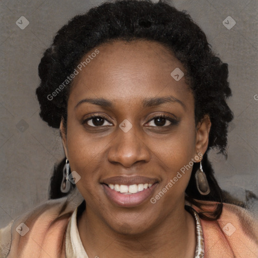 Joyful black young-adult female with long  black hair and brown eyes