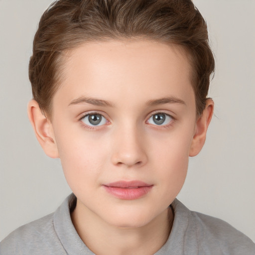 Joyful white child female with short  brown hair and grey eyes