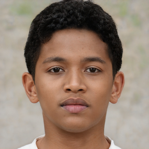 Neutral latino child male with short  brown hair and brown eyes