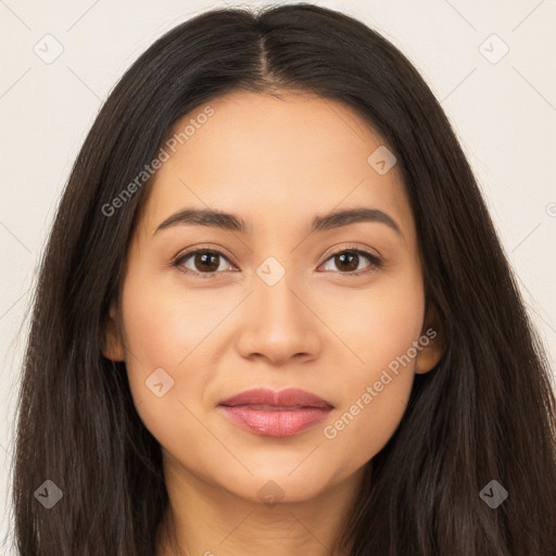 Joyful latino young-adult female with long  brown hair and brown eyes