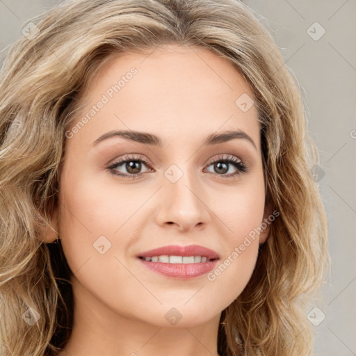 Joyful white young-adult female with long  brown hair and green eyes