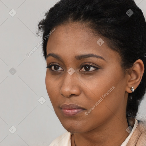 Neutral black young-adult female with long  black hair and brown eyes