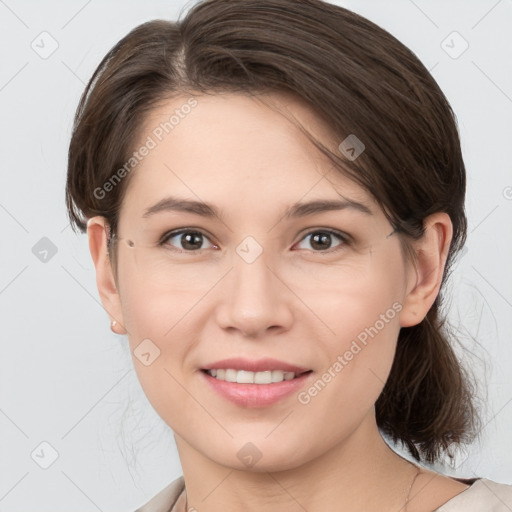 Joyful white young-adult female with medium  brown hair and brown eyes