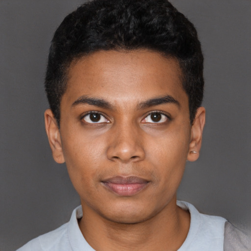 Neutral black young-adult male with short  black hair and brown eyes