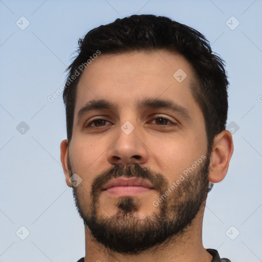 Neutral latino young-adult male with short  black hair and brown eyes