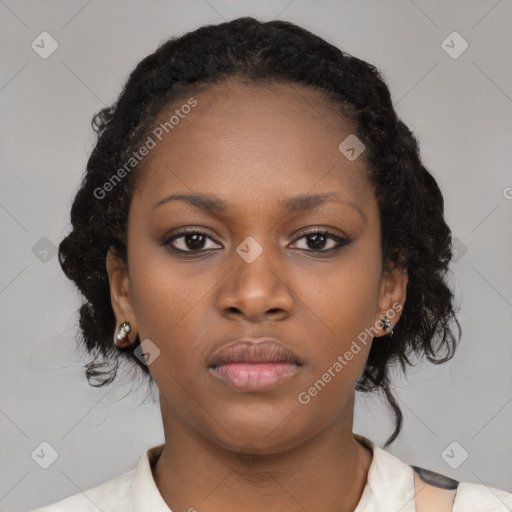 Neutral black young-adult female with medium  black hair and brown eyes