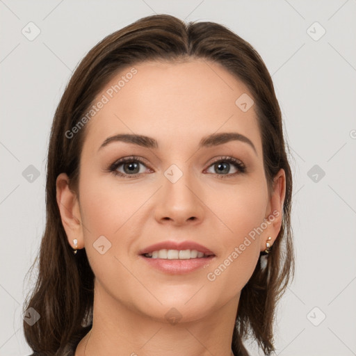 Joyful white young-adult female with medium  brown hair and brown eyes