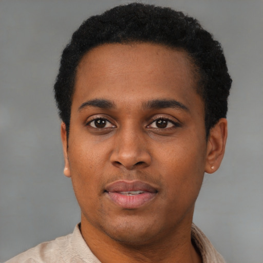 Neutral black young-adult male with short  black hair and brown eyes