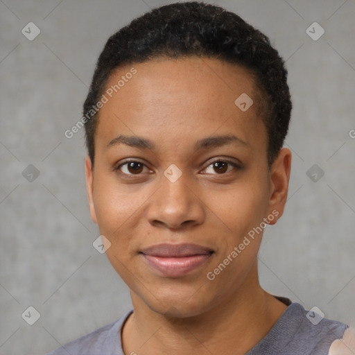 Joyful black young-adult female with short  black hair and brown eyes